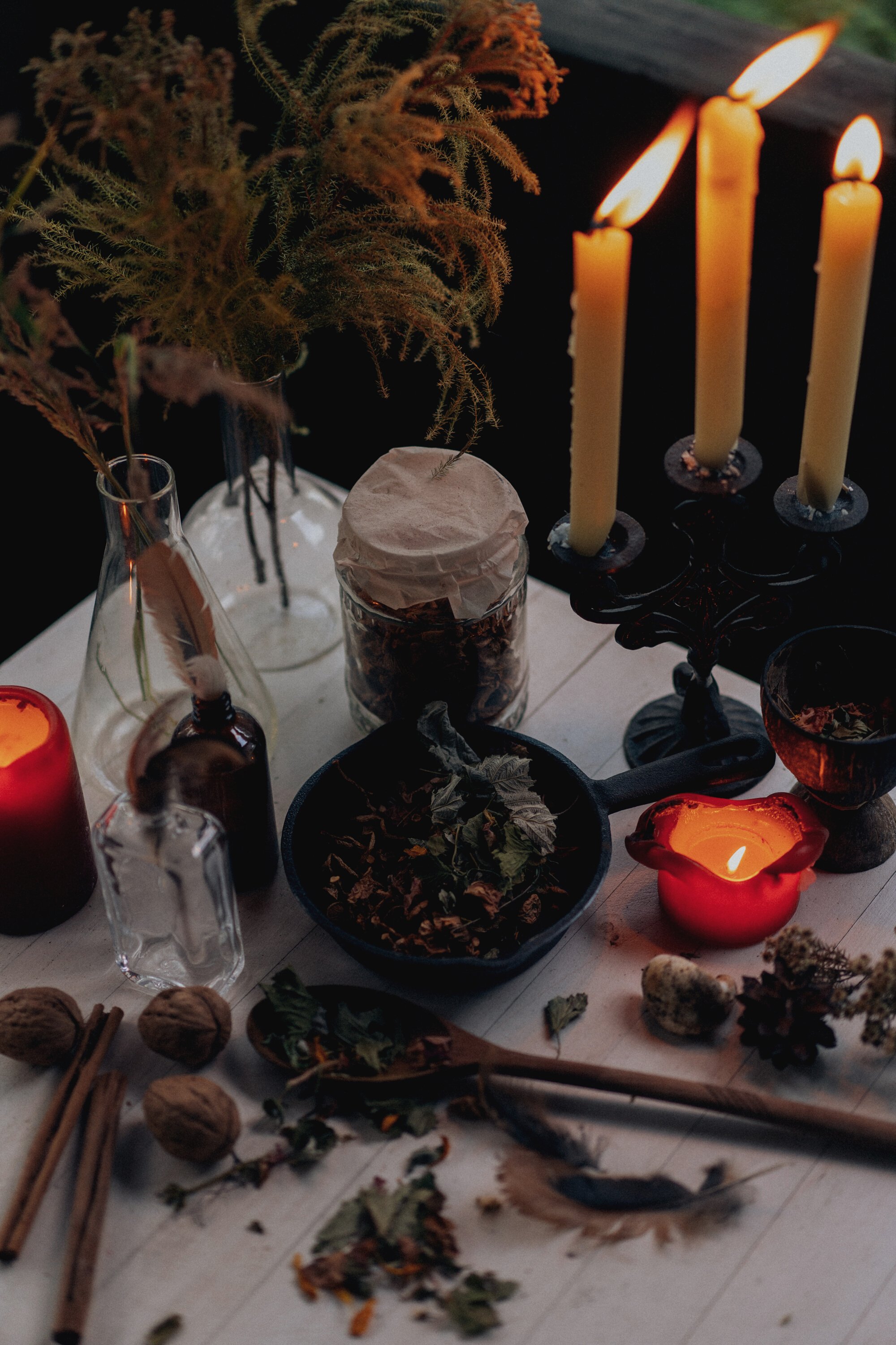 Lighted Candles and Dried Herbs